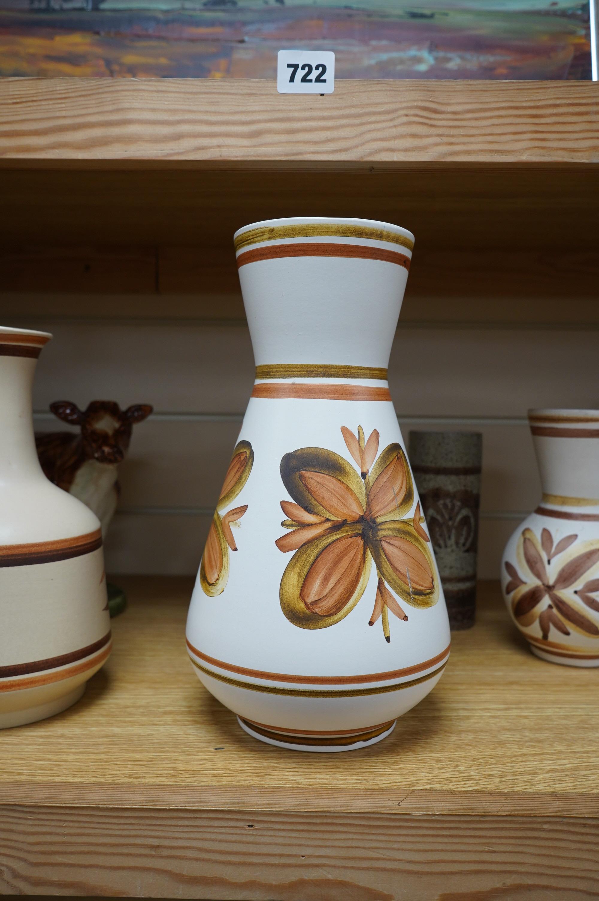 David Sharp, an Ayrshire cow produced for Bayer, and three Cinque Ports Rye vases and a carafe, largest 28cm high. Condition - good